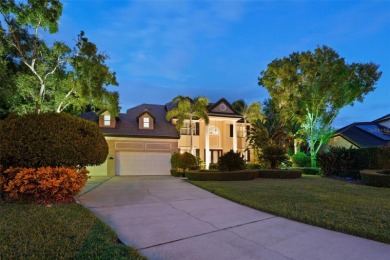 This onc of a kind residence sits on over 1.3 acres with serene on East Lake Woodlands Country Club in Florida - for sale on GolfHomes.com, golf home, golf lot