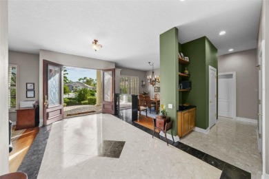 This onc of a kind residence sits on over 1.3 acres with serene on East Lake Woodlands Country Club in Florida - for sale on GolfHomes.com, golf home, golf lot