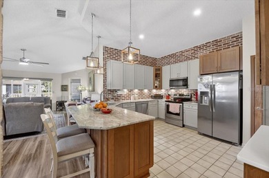 Beautifully renovated and luxuriously upgraded, this stunning on Falcon Watch Golf Club in Florida - for sale on GolfHomes.com, golf home, golf lot