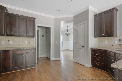Stunning, semi-custom home located in the highly sought gated on Anderson Creek Golf Club in North Carolina - for sale on GolfHomes.com, golf home, golf lot