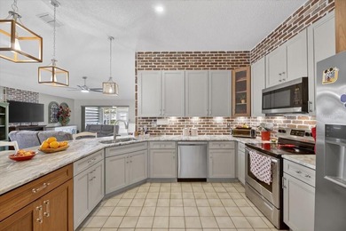 Beautifully renovated and luxuriously upgraded, this stunning on Falcon Watch Golf Club in Florida - for sale on GolfHomes.com, golf home, golf lot