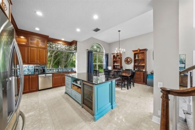 This onc of a kind residence sits on over 1.3 acres with serene on East Lake Woodlands Country Club in Florida - for sale on GolfHomes.com, golf home, golf lot