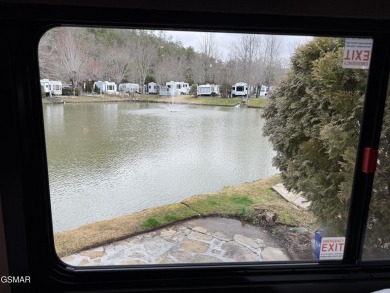 Beautifully landscaped LAKEFRONT RV lot in the sought after on Bent Creek Golf Course in Tennessee - for sale on GolfHomes.com, golf home, golf lot