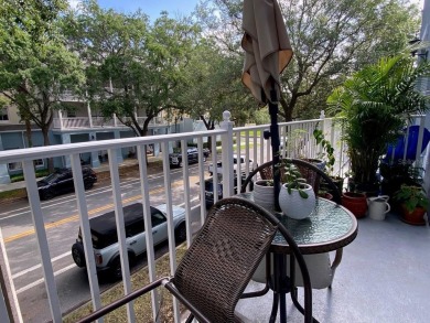 Spacious 2 bedrooms, 2 1/2 bath condo right in the main street on Celebration Golf Club in Florida - for sale on GolfHomes.com, golf home, golf lot