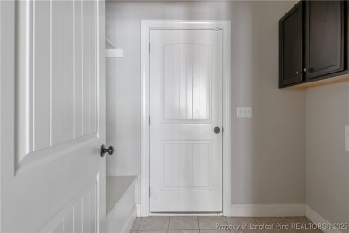 Stunning, semi-custom home located in the highly sought gated on Anderson Creek Golf Club in North Carolina - for sale on GolfHomes.com, golf home, golf lot