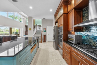 This onc of a kind residence sits on over 1.3 acres with serene on East Lake Woodlands Country Club in Florida - for sale on GolfHomes.com, golf home, golf lot