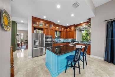 This onc of a kind residence sits on over 1.3 acres with serene on East Lake Woodlands Country Club in Florida - for sale on GolfHomes.com, golf home, golf lot