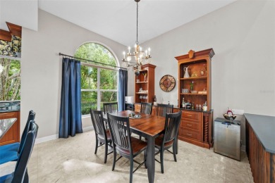 This onc of a kind residence sits on over 1.3 acres with serene on East Lake Woodlands Country Club in Florida - for sale on GolfHomes.com, golf home, golf lot
