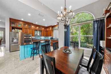 This onc of a kind residence sits on over 1.3 acres with serene on East Lake Woodlands Country Club in Florida - for sale on GolfHomes.com, golf home, golf lot
