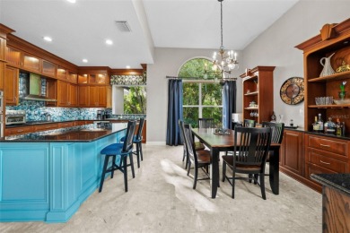 This onc of a kind residence sits on over 1.3 acres with serene on East Lake Woodlands Country Club in Florida - for sale on GolfHomes.com, golf home, golf lot