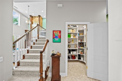 This onc of a kind residence sits on over 1.3 acres with serene on East Lake Woodlands Country Club in Florida - for sale on GolfHomes.com, golf home, golf lot