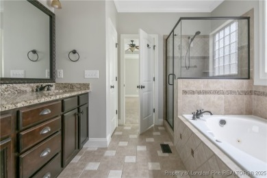 Stunning, semi-custom home located in the highly sought gated on Anderson Creek Golf Club in North Carolina - for sale on GolfHomes.com, golf home, golf lot