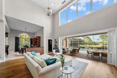 This onc of a kind residence sits on over 1.3 acres with serene on East Lake Woodlands Country Club in Florida - for sale on GolfHomes.com, golf home, golf lot