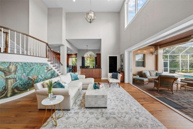 This onc of a kind residence sits on over 1.3 acres with serene on East Lake Woodlands Country Club in Florida - for sale on GolfHomes.com, golf home, golf lot