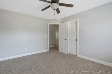 Stunning, semi-custom home located in the highly sought gated on Anderson Creek Golf Club in North Carolina - for sale on GolfHomes.com, golf home, golf lot