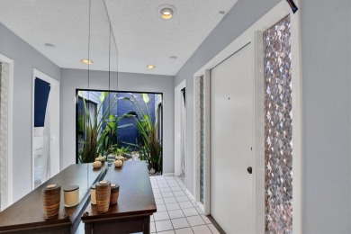 A Zen retreat on the green in Sarasota's sought-after Meadows on The Meadows Golf and Country Club in Florida - for sale on GolfHomes.com, golf home, golf lot
