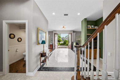 This onc of a kind residence sits on over 1.3 acres with serene on East Lake Woodlands Country Club in Florida - for sale on GolfHomes.com, golf home, golf lot