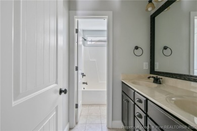 Stunning, semi-custom home located in the highly sought gated on Anderson Creek Golf Club in North Carolina - for sale on GolfHomes.com, golf home, golf lot