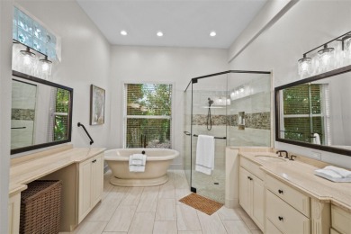 This onc of a kind residence sits on over 1.3 acres with serene on East Lake Woodlands Country Club in Florida - for sale on GolfHomes.com, golf home, golf lot