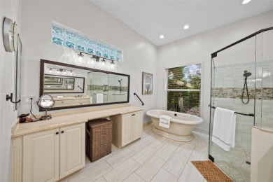 This onc of a kind residence sits on over 1.3 acres with serene on East Lake Woodlands Country Club in Florida - for sale on GolfHomes.com, golf home, golf lot