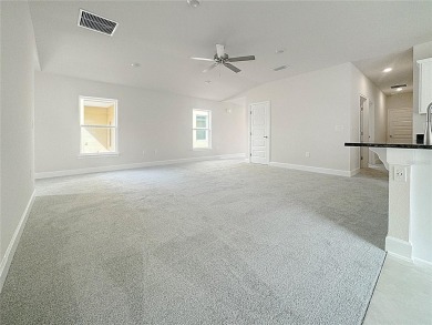 Move In Ready Home with a water view, 3 bedrooms and 2 bathrooms on Harmony Golf Preserve in Florida - for sale on GolfHomes.com, golf home, golf lot