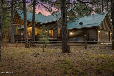 Experience mountain luxury and serene golf course living in this on Pinetop Lakes Golf and Country Club in Arizona - for sale on GolfHomes.com, golf home, golf lot