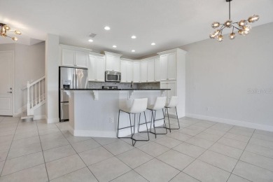 One or more photo(s) has been virtually staged. Seller may on Eagle Creek Golf Club in Florida - for sale on GolfHomes.com, golf home, golf lot