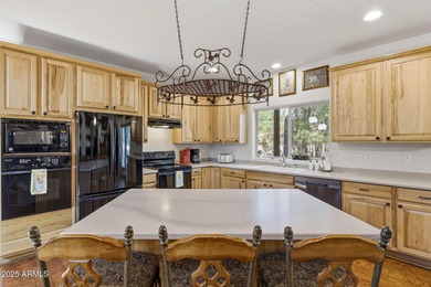 Experience mountain luxury and serene golf course living in this on Pinetop Lakes Golf and Country Club in Arizona - for sale on GolfHomes.com, golf home, golf lot