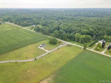 Vacant land in the prestigious Timber Point Estates ready for on The Timbers Golf Club in Michigan - for sale on GolfHomes.com, golf home, golf lot