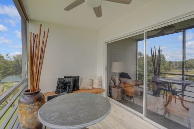 Wake up to sparkling lake views in this bright 1BR/1.5BA Palm on Palm-Aire Country Club and Resort - The Oaks in Florida - for sale on GolfHomes.com, golf home, golf lot
