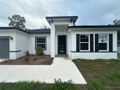 Check out this amazing 4-bedroom home in Citrus Springs! If on Citrus Springs Country Club in Florida - for sale on GolfHomes.com, golf home, golf lot