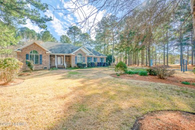 Beautiful, custom built home in the gated, golf and waterfront on Sound Golf Links at Albemarle Plantation in North Carolina - for sale on GolfHomes.com, golf home, golf lot
