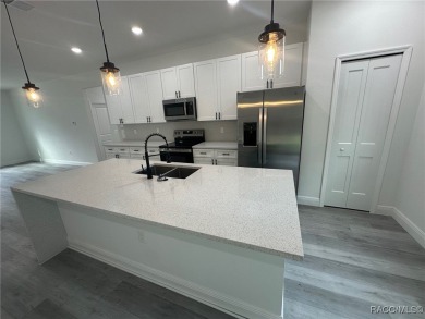 Check out this amazing 4-bedroom home in Citrus Springs! If on Citrus Springs Country Club in Florida - for sale on GolfHomes.com, golf home, golf lot