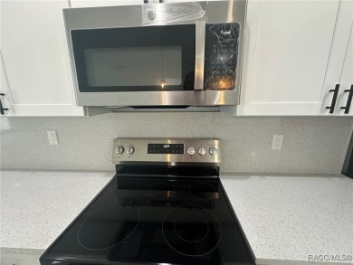 Check out this amazing 4-bedroom home in Citrus Springs! If on Citrus Springs Country Club in Florida - for sale on GolfHomes.com, golf home, golf lot