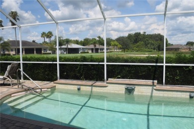 Enjoy some of the most stunning sunsets from this Pool Home with on Tampa Bay Golf and Country Club in Florida - for sale on GolfHomes.com, golf home, golf lot