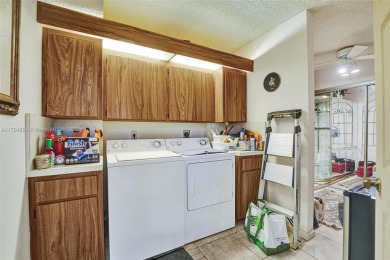 This spacious 2-bedroom, 2-bath Whitehall condo is located in on Pine Island Ridge Country Club in Florida - for sale on GolfHomes.com, golf home, golf lot