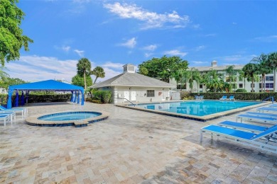 This spacious 2-bedroom, 2-bath Whitehall condo is located in on Pine Island Ridge Country Club in Florida - for sale on GolfHomes.com, golf home, golf lot