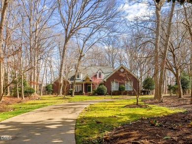 Overlooking the 16th fairway in the prestigious Treyburn golf on Treyburn Country Club in North Carolina - for sale on GolfHomes.com, golf home, golf lot