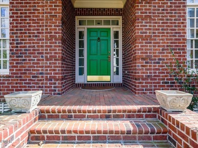 Overlooking the 16th fairway in the prestigious Treyburn golf on Treyburn Country Club in North Carolina - for sale on GolfHomes.com, golf home, golf lot
