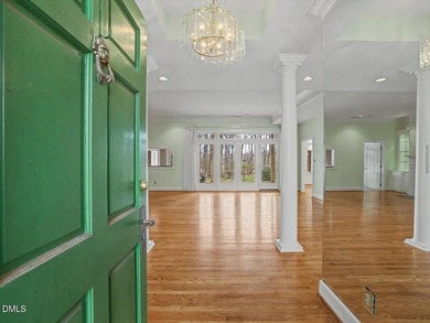 Overlooking the 16th fairway in the prestigious Treyburn golf on Treyburn Country Club in North Carolina - for sale on GolfHomes.com, golf home, golf lot