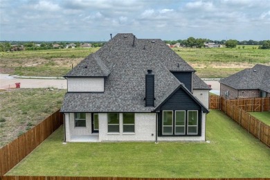 Welcome to 2129 Stone River Blvd, where elegance meets everyday on Stone River Golf Club in Texas - for sale on GolfHomes.com, golf home, golf lot
