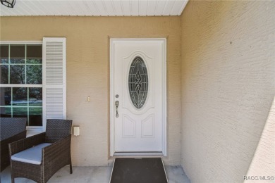 Tucked away on a VERY INTIMATE and ISOLATED.55-acre corner lot on Citrus Springs Country Club in Florida - for sale on GolfHomes.com, golf home, golf lot