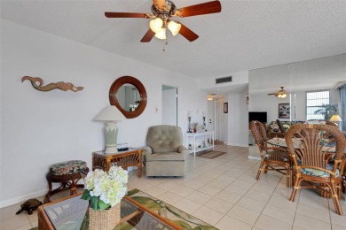 Enjoy the best of Florida living with this beautiful 2-bedroom on Isla Del Sol Yacht and Country Club in Florida - for sale on GolfHomes.com, golf home, golf lot