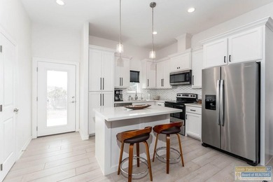 Welcome to 11 North Bay Hill, a beautifully crafted 2024 home on South Padre Island Golf Club in Texas - for sale on GolfHomes.com, golf home, golf lot