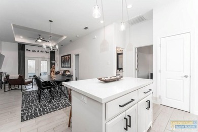 Welcome to 11 North Bay Hill, a beautifully crafted 2024 home on South Padre Island Golf Club in Texas - for sale on GolfHomes.com, golf home, golf lot