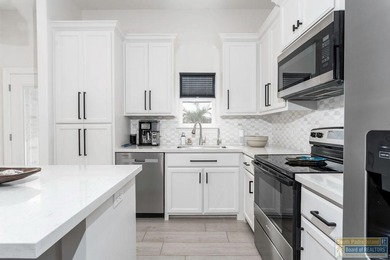 Welcome to 11 North Bay Hill, a beautifully crafted 2024 home on South Padre Island Golf Club in Texas - for sale on GolfHomes.com, golf home, golf lot