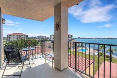 Enjoy the best of Florida living with this beautiful 2-bedroom on Isla Del Sol Yacht and Country Club in Florida - for sale on GolfHomes.com, golf home, golf lot