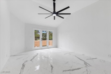 Experience ultimate luxury in this stunning Spanish Trail villa on Spanish Trail Golf and Country Club in Nevada - for sale on GolfHomes.com, golf home, golf lot