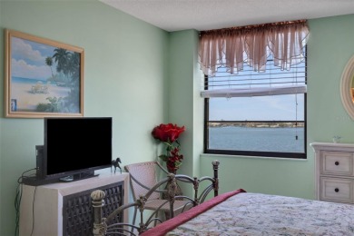 Enjoy the best of Florida living with this beautiful 2-bedroom on Isla Del Sol Yacht and Country Club in Florida - for sale on GolfHomes.com, golf home, golf lot