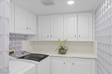 Experience ultimate luxury in this stunning Spanish Trail villa on Spanish Trail Golf and Country Club in Nevada - for sale on GolfHomes.com, golf home, golf lot